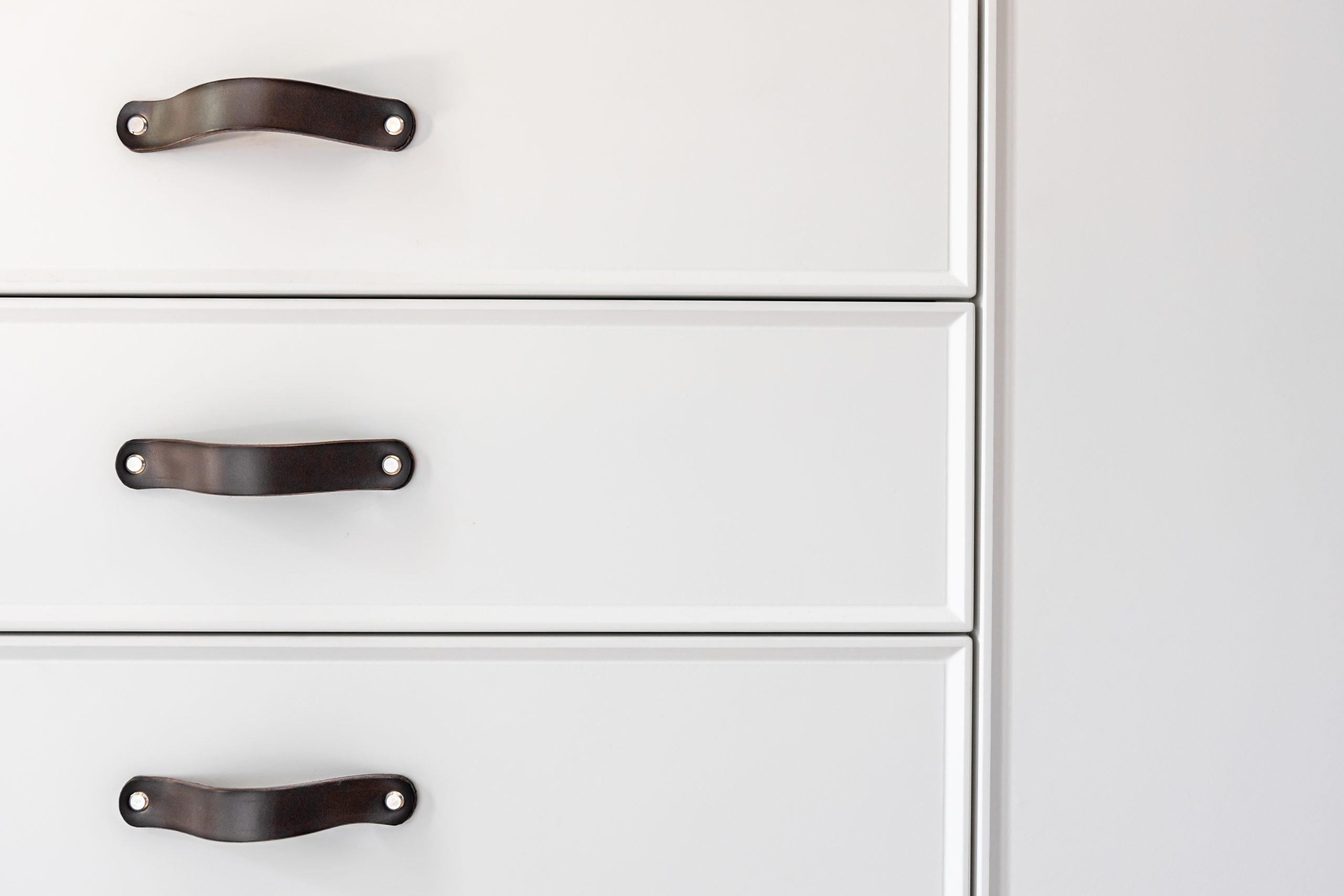 black-handles-of-the-kitchen-drawer-or-cabinet-2021-09-04-01-30-28-utc-scaled-1